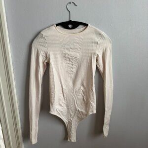 Free people intimately light pink seamless bodysuit